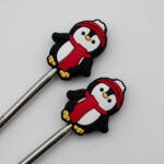 Knitting Margot stitch stoppers - penguins