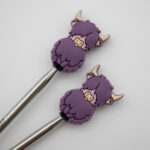 Knitting Margot stitch stoppers - yak purple
