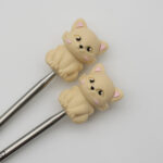 Knitting Margot stitch stoppers - cats cream