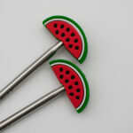 Knitting Margot stitch stoppers - melons